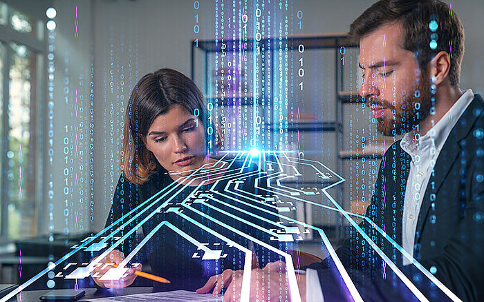 Business professionals in formal wear signing a contract in an office, with a holographic AI or robotics interface in the background.
